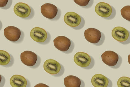 Collage photo of kiwi fruit on light khaki color, pattern of food