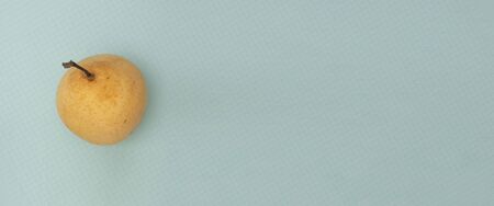 Photo of yellow pear banner with copy space for you text
