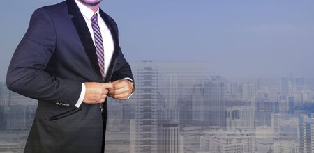 Businessman getting ready for next challange of the dayの写真素材