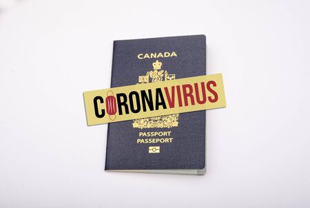 Travel plan cancelled due to corona virus pandemic showed on passportの写真素材