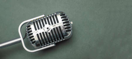 Vintage Microphone banner with green area copy spaceの写真素材