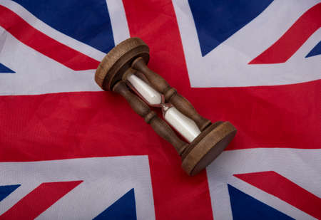 Yellow tea cup on multi color banner background.の写真素材