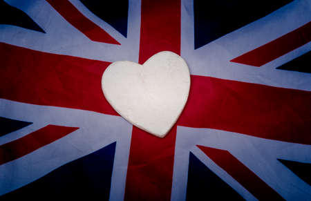 White heart shape on UK flag - love for England.の写真素材
