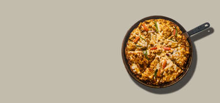 Isolated pan of delicious Pizza with grey banner template.の写真素材
