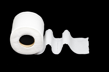 Toilet Paper on Black backgroundの写真素材
