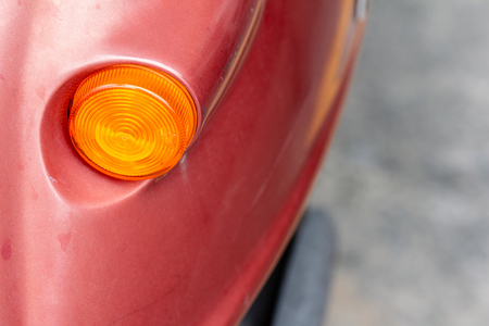 Scooter turn signal light, Orange circle light. part of scooter.の写真素材
