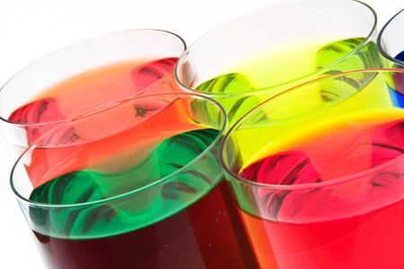 Background of Glass with drink red, blue, yellow and green colorの写真素材