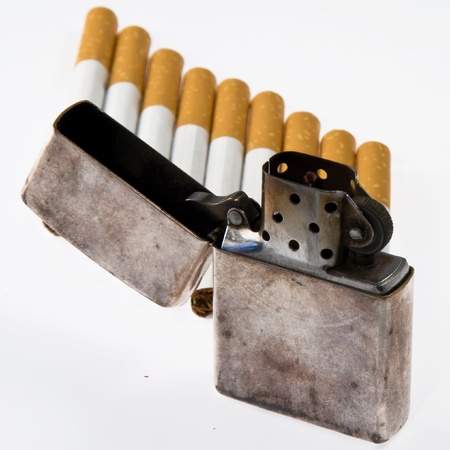 Cigarettes and lighters, isolated on white backgroundの写真素材