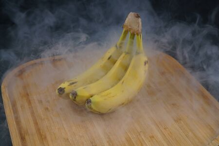 Fresh banana on dark background stock photoの写真素材