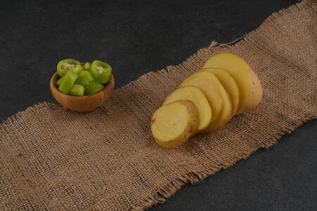 Fresh patato on dark background stock photoの写真素材