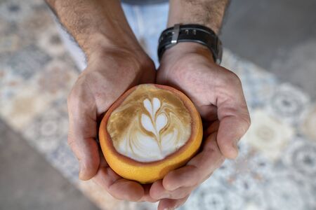 LATTE IN ORANGE SHELLの写真素材