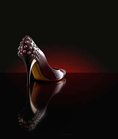 woman shoes on the dark background の写真素材