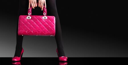 fashionable woman with a pink bag,fashion photoの写真素材