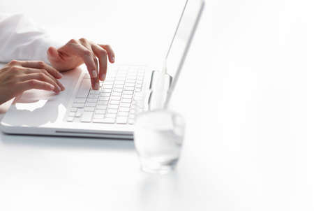 Businesswoman working at laptop computer