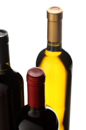 bottles of red and white wine on white backgroundの写真素材