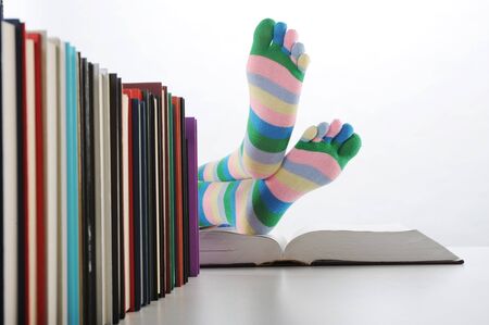 Tired of studies, student  with his feet up on his desk, similar pictures on my portfolio
