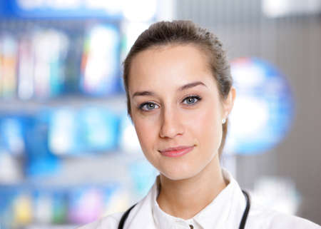 portrait of a female pharmacist at pharmacyの写真素材