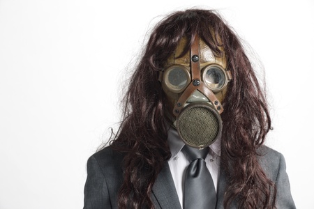 crazy businessman with gas maskの写真素材