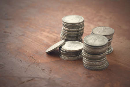 italian old coins on wooden table