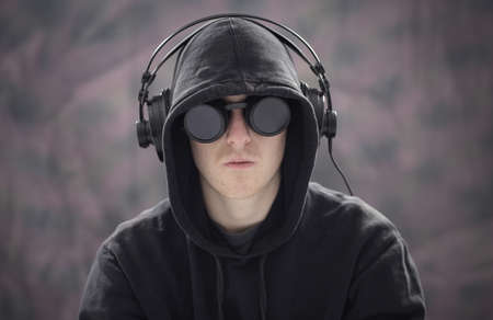 Young man listening musicの写真素材