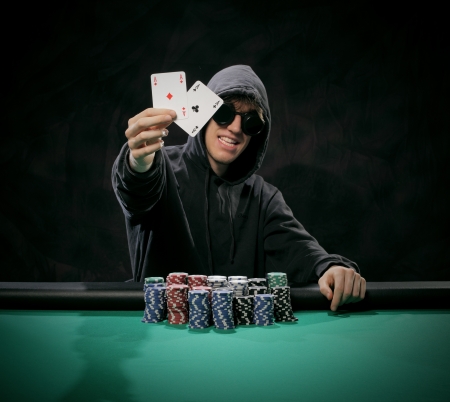 the winner of the tournament shows the winning cards