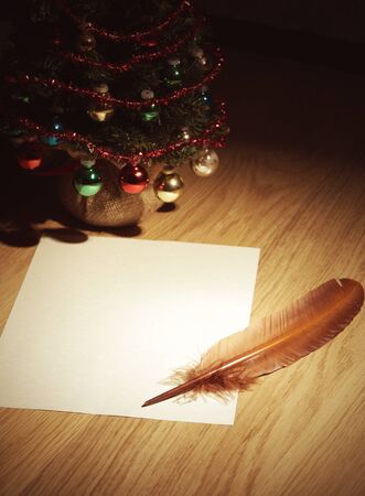 Christmas tree with gifts and greeting card, copy spaceの写真素材