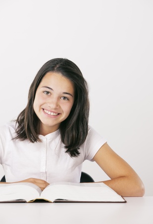 Young girl with book, copy spaceの写真素材