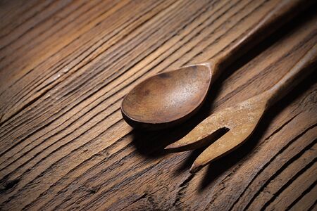 wooden kitchen accessories on old wood backgroundの写真素材