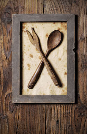Fork and spoon wooden framed, menu coverの写真素材
