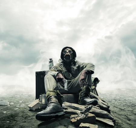 Environmental disaster. Post apocalyptic survivor in gas maskの写真素材