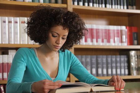 Portrait of female student in library