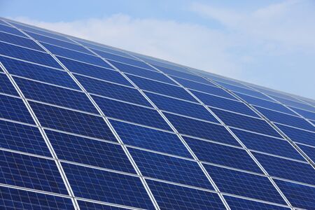 Green energy. Solar Panels in clear blue sky