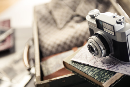 Vintage travel equipment with old camera and suitcase.の写真素材
