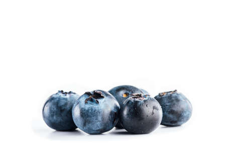 Fresh tasty blueberries on white background, nutrition and vitamins conceptの写真素材