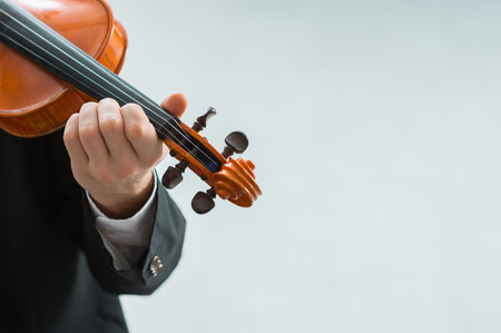 Talented violinist and classical music player solo performance, blank copy space on the rightの写真素材