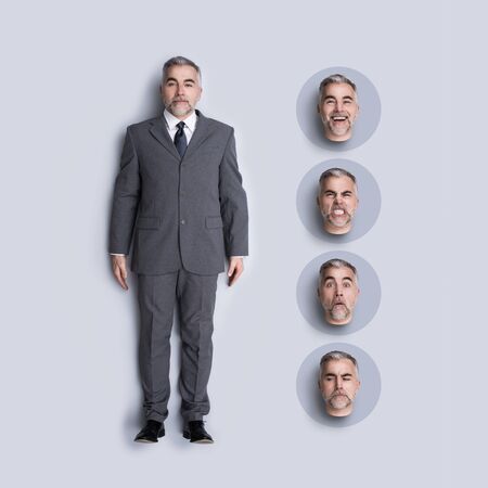 Realistic corporate business executive doll with interchangeable heads and expressions, flat layの写真素材