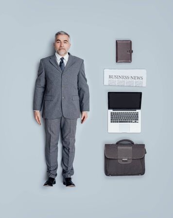 Realistic corporate business executive doll with work tools, flat layの写真素材