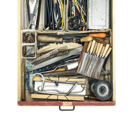 Used do it yourself work hardaware tools in a drawer top view, white backgroundの写真素材