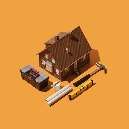 Home renovation, DIY and house improvement: model house with isometric toolsの写真素材