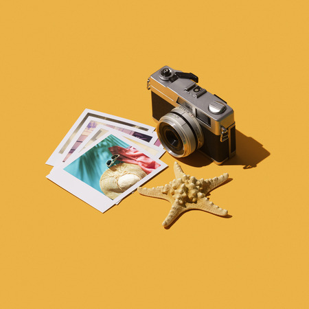 Summertime beach vacations photos and camera, traveling and tourism conceptの写真素材