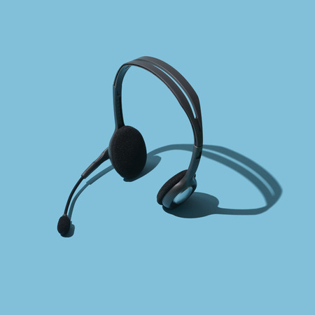 Call center helpdesk headset with microphone: customer support and telemarketing conceptの写真素材