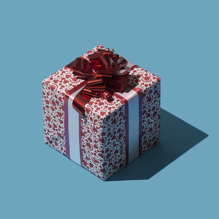 Romantic Valentine's day gift with ribbon and decorated wrapping paper, love and romance conceptの写真素材