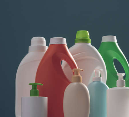 Cleaning product plastic container for house clean on blue background. household chemicalsの写真素材