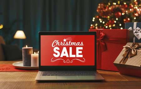 Online shopping and Christmas sale offers on a laptop