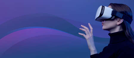 Woman wearing a VR headset and interacting with virtual reality, simulation and metaverse concept
