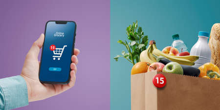 Woman holding a smartphone and ordering grocery online, user interface with shopping cart