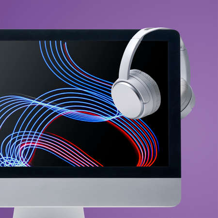 Computer with sound waves video and wireless headphones, online video and music entertainment