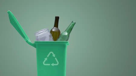 Garbage can full of glass waste, recycling and separate waste collection conceptの写真素材