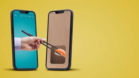 Sushi restaurant food delivery app on smartphone, user holding chopsticks and eating sushi