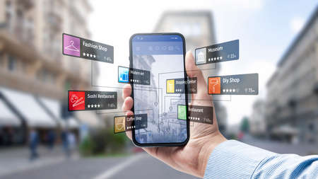 Tourist exploring a city using an augmented reality app on smartphone, she is searching for services...